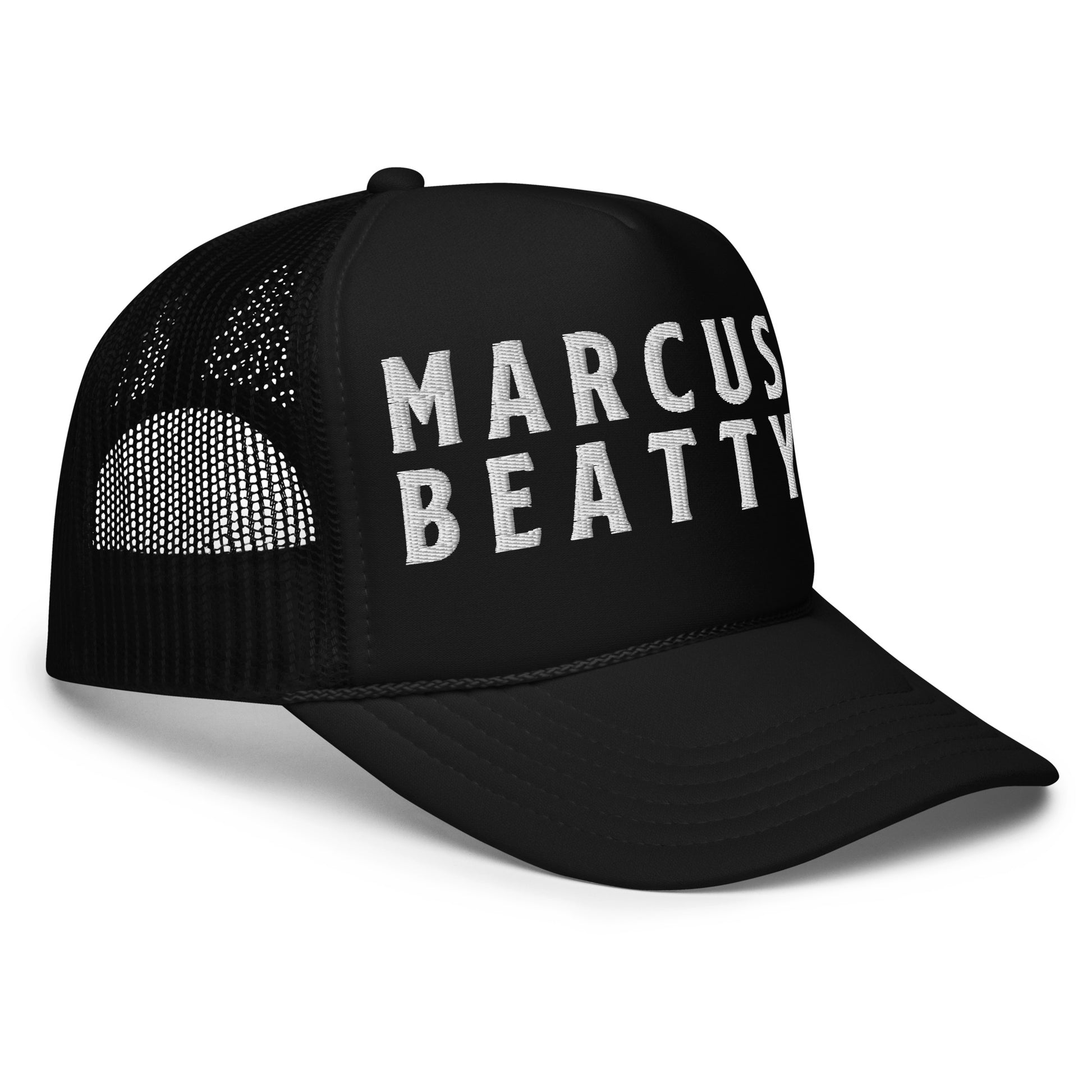 Left-Side view of the Marcus & Beatty Dual Flame Logo Trucker Hat, black foam and mesh cap with adjustable snap, front logo embroidered in white, unisex fit.