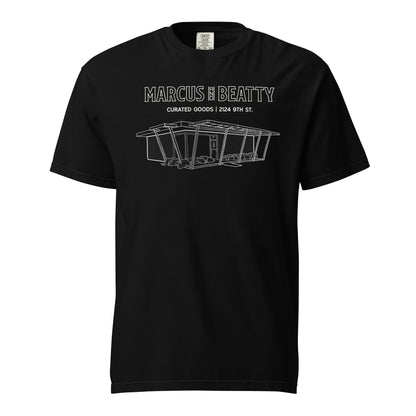 Front View of the Black Marcus & Beatty Mid-Century Storefront Sketch Tee, featuring sketch of storefront design, Comfort Colors garment-dyed cotton, unisex relaxed fit.