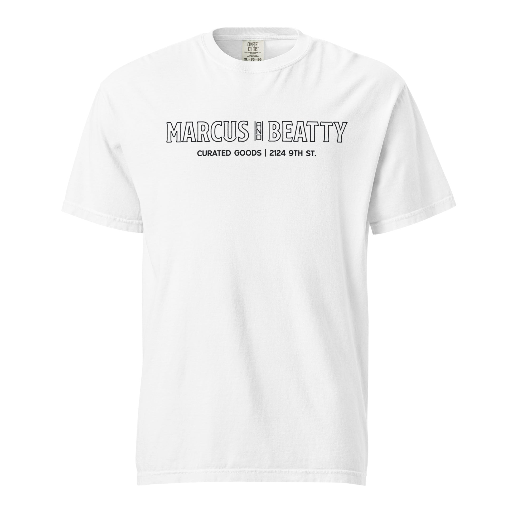 Front View of the Marcus & Beatty Storefront Logo Tee on Comfort Colors garment-dyed cotton, with front logo print inspired by storefront, unisex relaxed fit, white color.