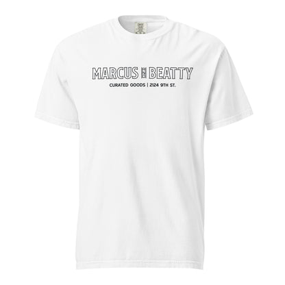 Front View of the Marcus & Beatty Storefront Logo Tee on Comfort Colors garment-dyed cotton, with front logo print inspired by storefront, unisex relaxed fit, white color.